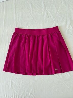 ALO Yoga Varsity Tennis Skirt in a pink size S like a new